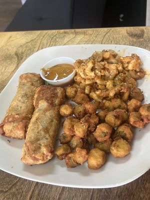 The vegan Philly egg roll  with fried okra’s and Mac and cheese   at The Herbal Farmercy in Greenville