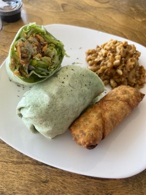 Chkn wrap, mac n cheese, egg roll — egg roll was a lil spicy   at The Herbal Farmercy in Greenville