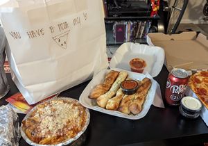 I ordered the Baked Ziti with focaccia and bread sticks with extra sauce. at Pizza Heaven Bistro in Phoenix