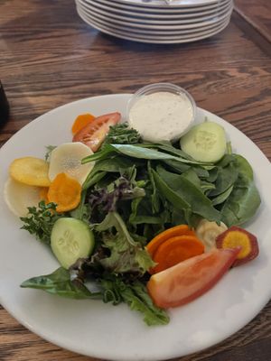 House salad w/ a side of vegan ranch   at Pizza Heaven Bistro in Phoenix