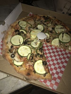 Got excited and ate a piece 🙈 Vegan veggie pizza!  at Pizza Heaven Bistro in Phoenix