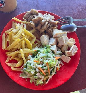 Fried potato, tofu and tempeh, veggies.  at Erna Warung in Karangasem