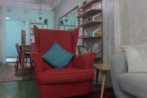 Signature red chair  at Kneading Peace in Malacca