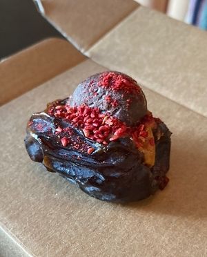 Date stuffed with peanut butter and chocolate .  at Loui in Munich