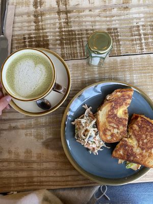 Cheddar, somked tofu and kimchi toastie. Matcha oat latte    at Heaphys in Glastonbury
