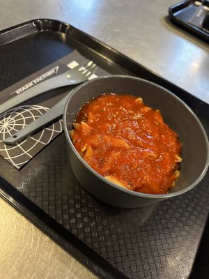 Vegan penne pasta with red sauce  at Disneyland - Stark Factory in Chessy