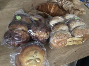 Almond cake (gevulde koek), raisin buns and brown buns for take away  at De Vegan Bakker in Heusden