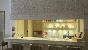 The slick kitchen. The plasterwork was wonderful and a local traditional style.  Loved it the look was slick all through. The WiFi was free and the loos are clean and lovely too ! at World Storytelling Cafe in Marrakech