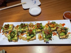 Chef Rocky’s vegan creation! Spicy Partly fried, , rice, tofu, & veggies! The best “roll” I’ve ever had!!!   at Katsunori Sushi in Hesperia