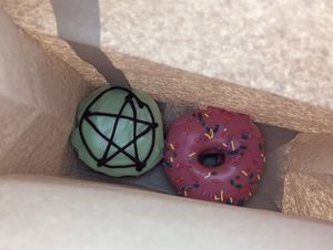 Avocado donut and the Simpsons donut, both vegan at Hideout Coffee Co in Portsmouth