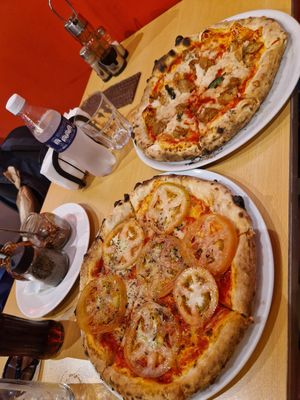 Argentinian napolitana (bottom) and no-chicken margarita (up) at Bella Napoli in Punta Cana