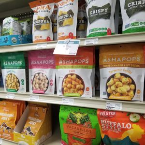 Asha pops! Taste like popcorn, but actually water lily seeds. Yum! at Chamberlin's Natural Foods Market in Kissimmee