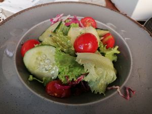 Side salad, you can add your own vinegar and olive oil at Rostelin in Piran