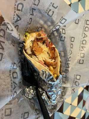 Build your own taco: flour shell with vegan chorizo, smashed tater tots, corn salsa, pickled red onions, lettuce, and a spicy sauce    at Condado Tacos in Ann Arbor