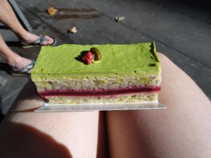Supreme with pistachios and raspberries at Pasteleria La Estrella Cake Shop in Barcelona