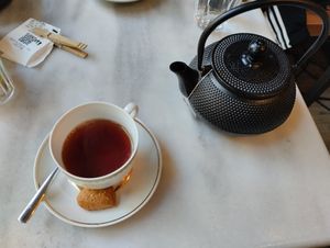 Black tea. The cookie is also vegan. at Eklektik in Thessaloniki