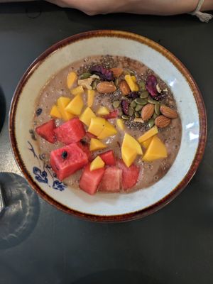Brown smoothie bowl (A) at Madame Hà in Con Dao