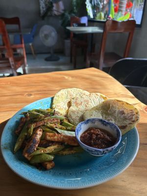 Indian, spicy sauteed okra with naan, amazing!  at Madame Hà in Con Dao