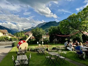 The garden and the fondue bowl  at Fondue Villa & Garden in Unterseen