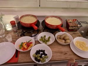 Vegan almond fondue on the left, traditional fondue on the right 🫕  at Fondue Villa & Garden in Unterseen