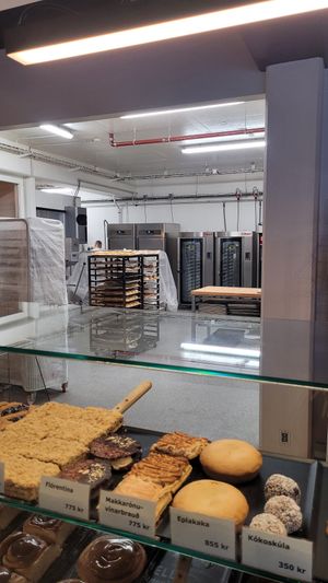 Glass bakery behin the front desk at Brauðgerðarhús Akureyrar in Akureyri