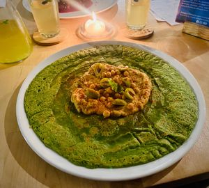 Vegan pancake with hummus at Pirmas Blynas in Vilnius