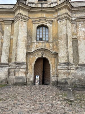 The open door and pictures that drew us in    at Pirmas Blynas in Vilnius