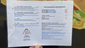 Menu (vegan items marked with a green V).   at Lava'47 in Hella