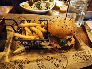 Lunch special: fries + veggie patty w/ I.M. Possible signature pairing toppings at Burger Village - Church Street in New York City