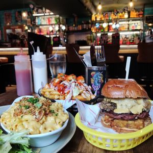 Mac & cheese with bacon bits, buffalo fries and black rabbit burger. at Rabbit Food @ Meadows Tap in Edinburgh