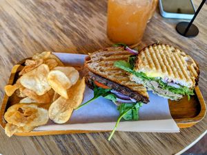 Pesto panini with chips and mango tea. at Goji Berry in Phoenix