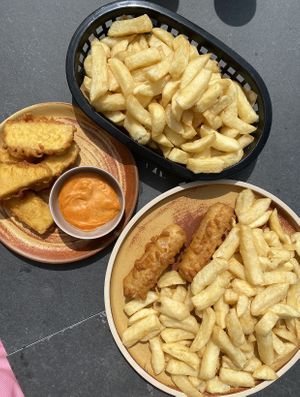 Battered sausage, battered tofu and chips  at Off The Hook in Haverfordwest