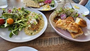 "Crab cakes", foccacia with vegan honey and feta at Salt and Pepper Social in Newcastle