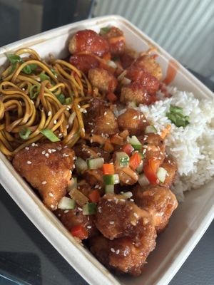 Bang bang cauliflower with noodles, sweet and sour chkn with boiled rice. This was the phat vegan 2 mains, all came in one box.   at WowYauChow - temporarily closed in Swinton