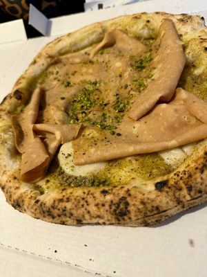 Pizza mortadella e pistacchio veg  at Assaje in Udine
