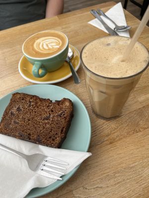 Oat milk coffee, iced chai and vegan banana bread  at Yellow Wood Cafe in Beeston
