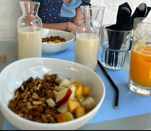 House made granola, with fresh fruit and oat or almond milk.  They juice fresh oranges and it's delicious.   at Parasagas in Folegandros