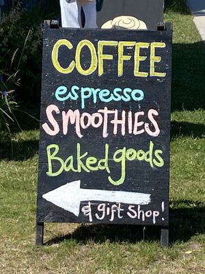 Signs on road  at The Dream Bean Machine in Grand Marais