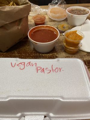 Vegan pastor burrito, vegan cheese sauce, beans  at Tanias 33 Dos Mundos in Tucson