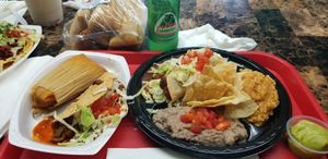 4 plate combo. Cauliflower rolled taco, vegan tamale, nopalitos Colorado hard taco and enchilada cibil at Tanias 33 Dos Mundos in Tucson