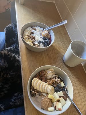 Açai bowl (top) and porridge with all vegan toppings  at Grød - Christianshavns in Copenhagen