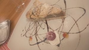 Hazelnut cake .homemade  coconut cream at Ristorante Peruggini in Vistarino