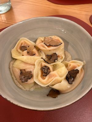 Ravioli di zucca su crema di porcini e tartufo  at Ristorante Peruggini in Vistarino