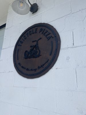 Outdoor sign   at Tricycle Pizza in Seaside