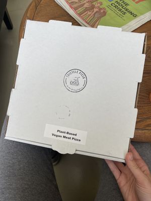 Boxes clearly labeled vegan   at Tricycle Pizza in Seaside