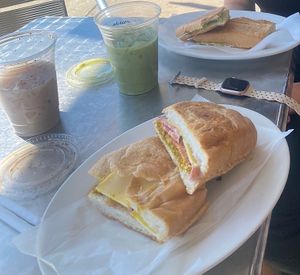 Breakfast sandwich with chai & avocado toast with match  at Cafe Hey in Tampa