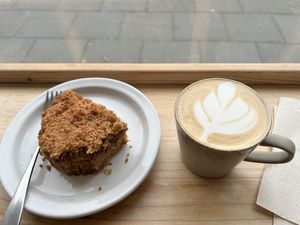 Coconut caramel cake with oat milk cappuccino   at Plantan Kaffihús in Reykjavik
