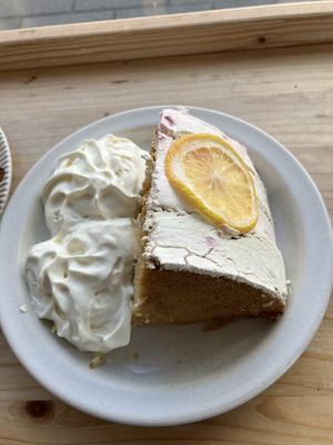 Lemon Raspberry cake with whipped cream, so pretty!  at Plantan Kaffihús in Reykjavik