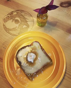Frenchie’s Toast-Texas Toast dipped in our “Moon Egg” mixture (Moong dal). Salted Cinnamon Butter. Banana Coconut Syrup.  at Fern's Diner + Drinkery in Cascade