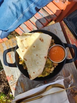 southwestern skillet (beans, green chile, moon eggs, cheese, tater tots) with tortilla and hot sauce at Fern's Diner + Drinkery in Cascade